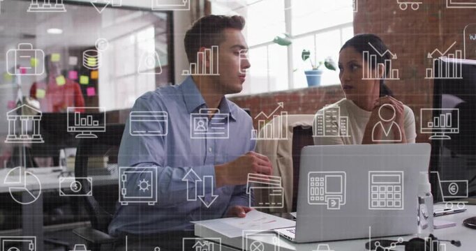 Man presenting docs and pointing, woman reviewing laptop while finance icons overlaying screen