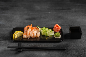 Side View of Prawns and Lemon with wasabi and ginger on the side, Japanese style © Sameeus