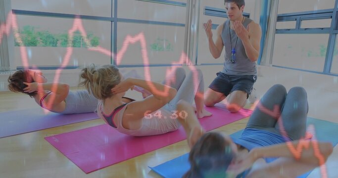 Crunching three women in athletic wear on studio mats, instructor kneeling with whistle, ECG 54