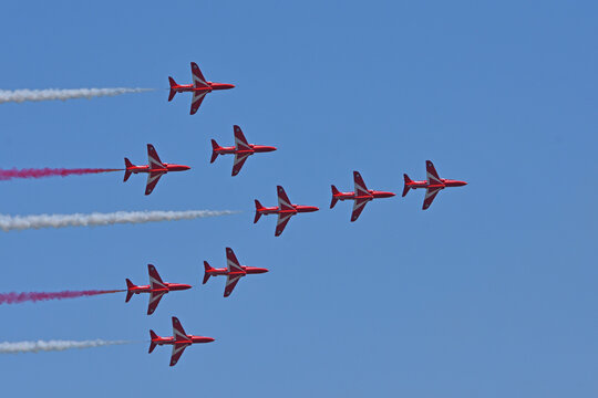 Ickwell, Bedfordshire, England - June 28 , 2025:  Red Arrows in formation flight blue sky