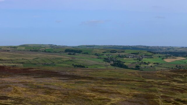 aerial view of of midgley moor showing the village of old town and high moorland landscape