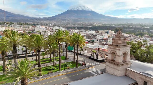 
Aerial view of Yanahuara Square and Portales with the snow-capped Misti volcano during the rainy season in Arequipa, Peru
