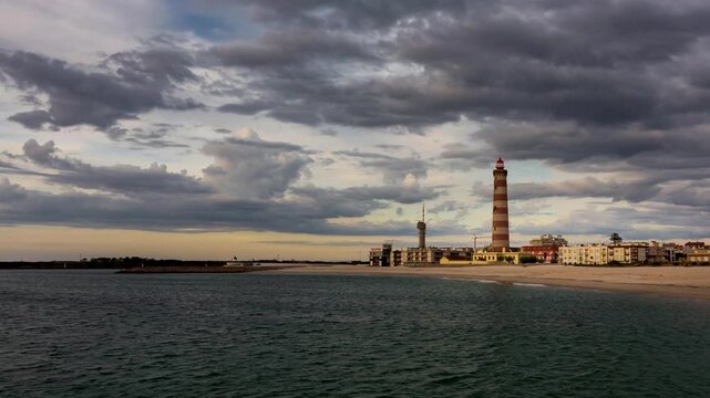 Dramatic Hyperlapse of Praia da Barra Lighthouse Under Stormy Clouds, Aveiro, Portugal