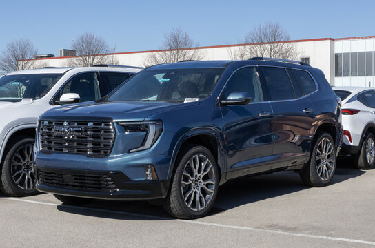 GMC Acadia Denali Ultimate FWD Mid-Size SUV display. GMC offers the Acadia with a 2.5L Turbo 4-Cylinder engine. MY:2026