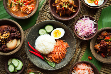 An array of traditional Korean dishes served in colorful bowls, highlighting the diversity and rich culinary heritage of Korea's national cuisine.