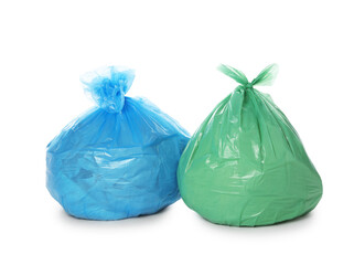 Garbage in plastic bags isolated on white
