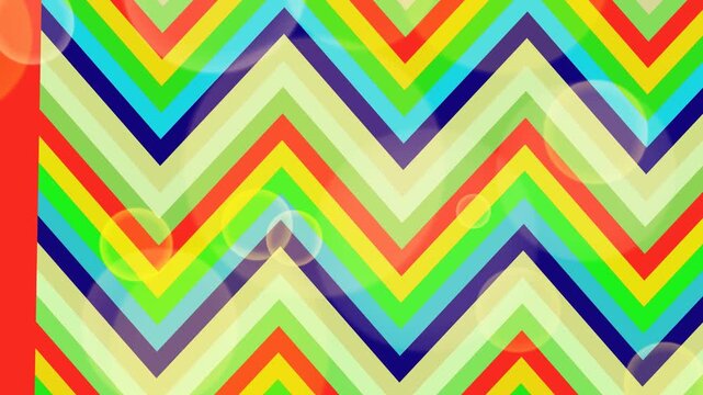 Vibrant Rainbow Chevron Pattern with Soft Bokeh Overlay
