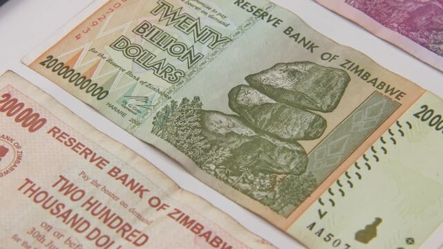 Close up of paper printed money in twenty billion, 200 thousand, and one dollar bill of Zimbabwe reserve bank inflated and inflation economy valueless moneys and poverty from 2020s in foreign value