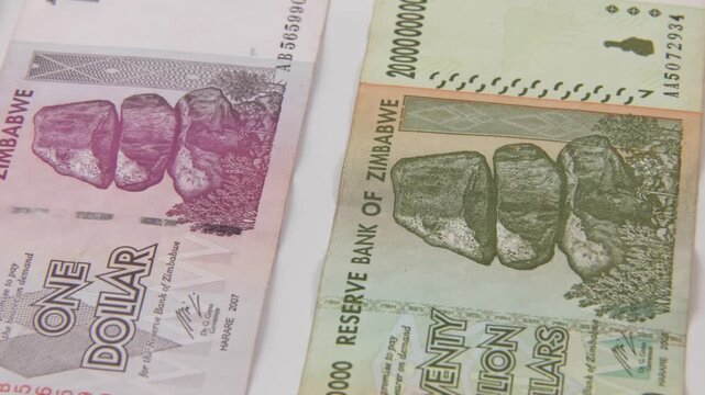 Close up of paper printed money in twenty billion, 200 thousand, and one dollar bill of Zimbabwe reserve bank inflated and inflation economy valueless moneys and poverty from 2020s in foreign value