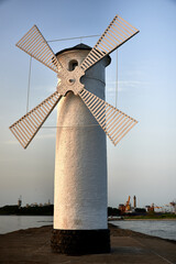 Fototapeta premium Stawa Mlyny Windmill Lighthouse on the Breakwater in Swinoujscie, Poland