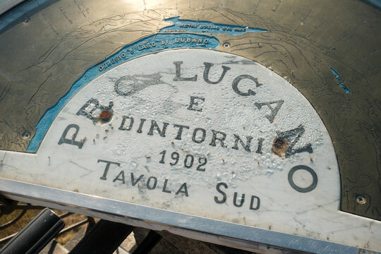 LUGANO, SWITZERLAND &ndash; OCTOBER 31, 2024: Orientation table showing Lake Lugano and surrounding geography at the summit viewpoint of Monte San Salvatore overlooking the Lugano region in Ticino