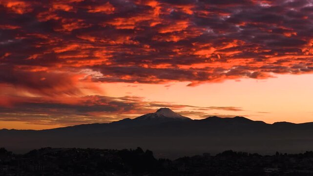Cayambe volcano at sunrise seen from Quito Ecuador Andes mountains