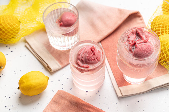 Summertime raspberry float drink. Refreshing summer beverage made with sparkling water