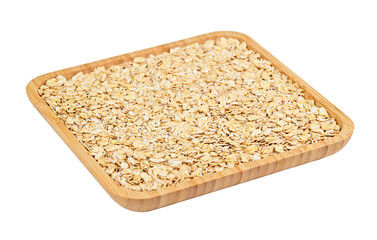 Oatmeal flocks in bamboo plate