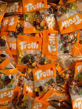 Trolli gummy candy packages heap overhead view