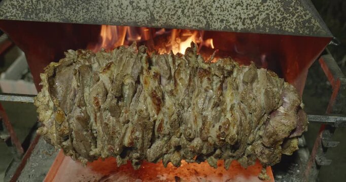 Traditional Erzurum Cag Kebab Cooking on Horizontal Spit