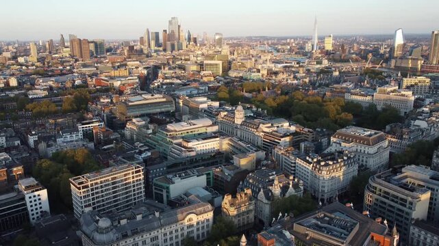 Sunset over Lincolns Inn Fields, London. This aerial view highlights the Holborn legal district amidst the citys historic landscape.