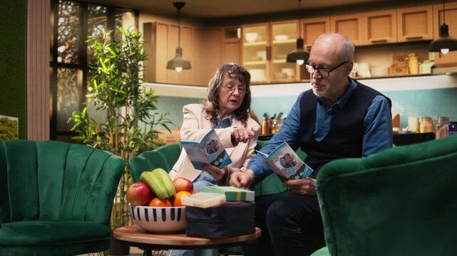 Senior people, medical advice, reading leaflet, calm home interior. Couple checking elderly care information and important guidance or advice for medical treatment, daily routine in old age.