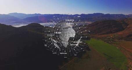 Floating holographic globe with radial grid overlaying low mountain valley, showing numeric labels