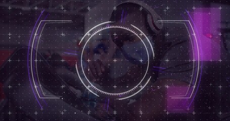 Displaying central HUD reticle over purple lounge, showing seated man wearing hoodie and headphones © vectorfusionart