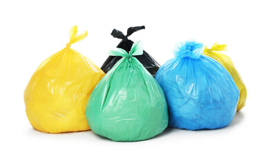 Garbage in plastic bags isolated on white