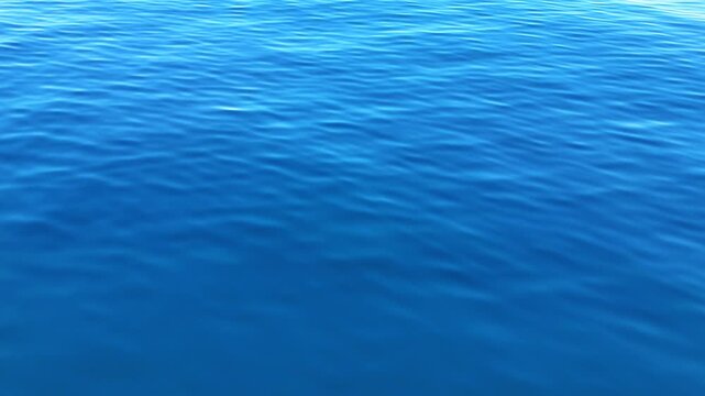 Aerial drone shot flying over calm blue ocean surface with shimmering sunlight reflection and gentle ripples, cinematic seascape background in natural daylight