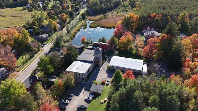 Drone footage of the historic Alton Mill Arts Centre in Caledon, Ontario, during the autumn season.
