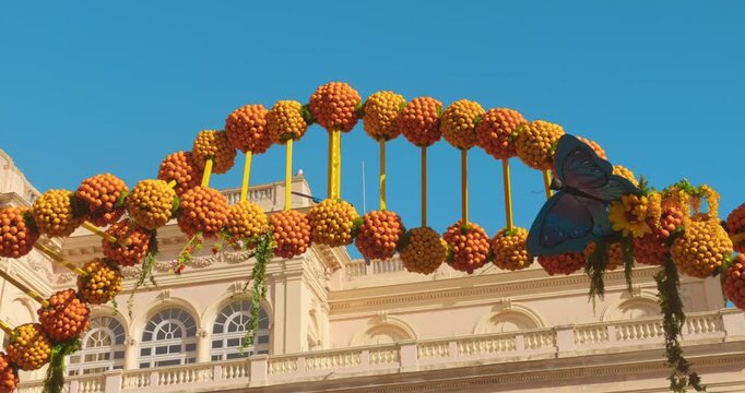 View of DNA inspired sculpture made with oranges and lemons during Fete du Citron festival in Menton France.