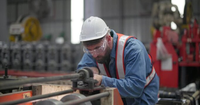 Metal workers use precise tools to verify dimensions during quality check and when setting up machines. Emphasizing accuracy, minimizing error, enhancing product quality in metal fabrication facility
