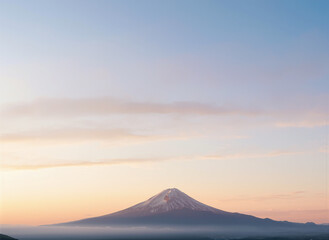 Mount Fuji at sunrise with soft pastel sky, minimal serene landscape, Japan