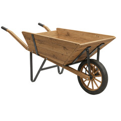 Rustic wooden wheelbarrow with black metal frame and spoked wheel isolated on white background