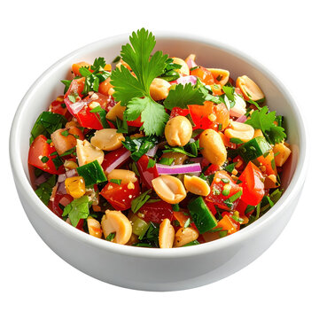 Vibrant peanut salad with tomatoes cucumbers red onion and cilantro in a white bowl isolated on white background