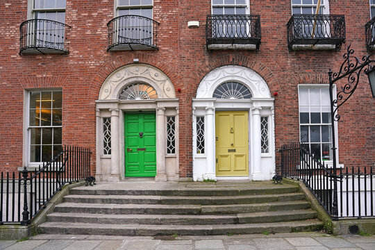 Georgian brick townhouses with colorful front doors in central Dublin