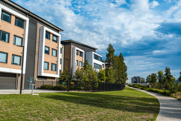 Obraz premium Residents and visitors experience suburban street life and community spaces in Oran Park Town, NSW, Australia, February 5, 2026