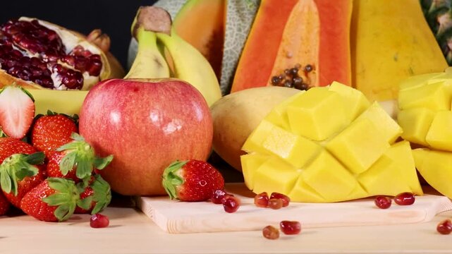 Close Up Pan of Vibrant Fresh Fruit Arrangement on Table