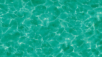 Fototapeta premium Top view of crystal clear tropical ocean water with bright sun reflections 