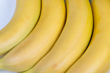 Organic banana display. Exhibition of naturally sourced ripe bananas at market. Market exhibit...