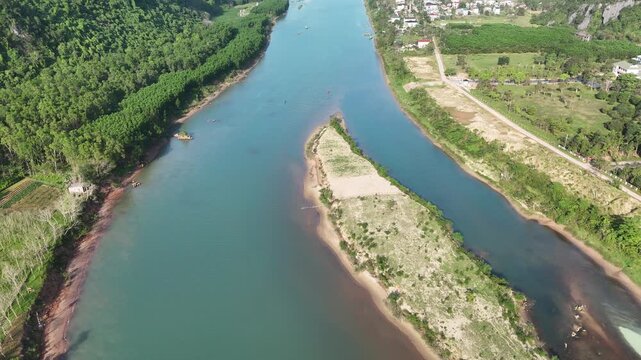 Phong Nha &ndash; Ke Bang National Park, Bo Trach, Quang Binh, Central Vietnam &ndash; 4K aerial footage of UNESCO Heritage site with Son River, limestone karst mountains, rice fields, tropical forest & cave