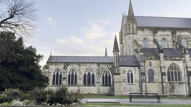 Gothic cathedral side nave with flying buttresses in Chichester England