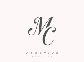 Obraz premium Elegant MC Monogram Logo for Creative Branding, Feminine Calligraphy, Luxury Script and Wedding Stationery Design