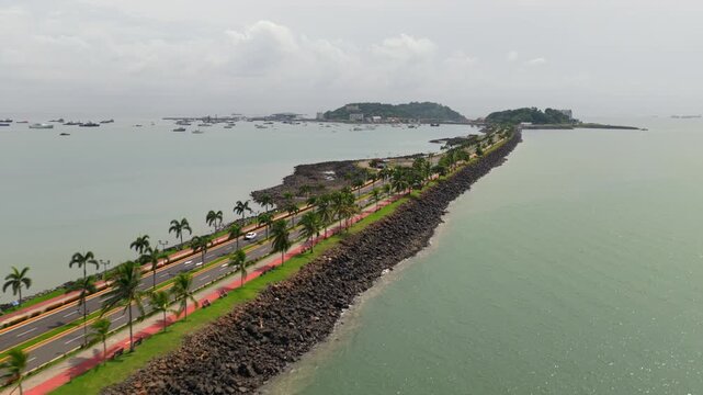 Drone view along Amador Causeway toward Flamenco and Perico Islands in Panama Bay, Panama City