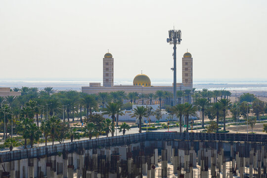 The modern Sharbatly Mosque with golden domes in King Abdullah Economic City (KAEC), Saudi Arabia