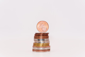 Close up of stacking coins on white background, USA one cent, Money growing concept, Save money with stack money coin for growing your business, copy space. The dime and the pennies