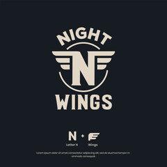 Obraz premium This bold and futuristic logo showcases a stylized winged monogram set against a dark background, symbolizing speed, power, and innovation.