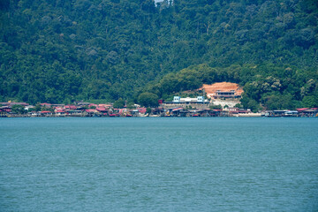fishing Village and Tropical Jungle Hillside at Pangkor Island, malaysia