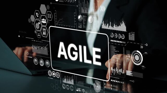 Professional business person interacting with digital interface showcasing Agile methodology in modern workspace. Asymptotic smart data analytic.