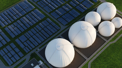 Aerial view of solar farm with biogas tanks in a green landscape