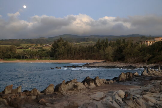 Full Moon rises over Dragon's Teeth in Maui, Hawaii