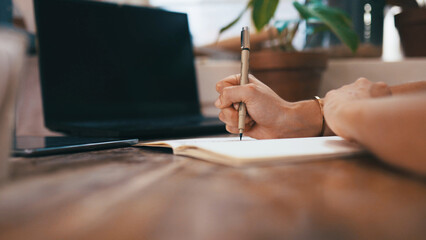 Notes, checklist or hands in nursery with laptop, stock control or delivery schedule in botanical...