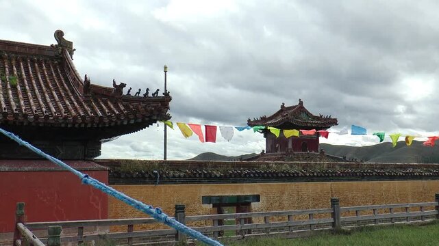 MONGOLIA, SELENGE - September 5, 2013: The territory of the Amarbayasgalant Mongolian Buddhist monastery and ritual objects on an autumn cloudy day.